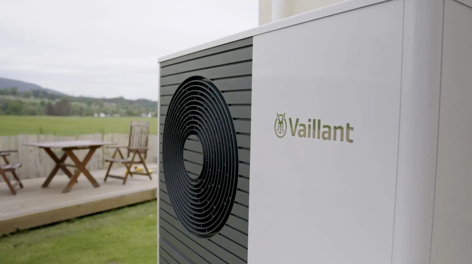 Close-up of the Vaillant Arotherm Plus 12kW heat pump unit at our Evanton install, with Highland landscape behind