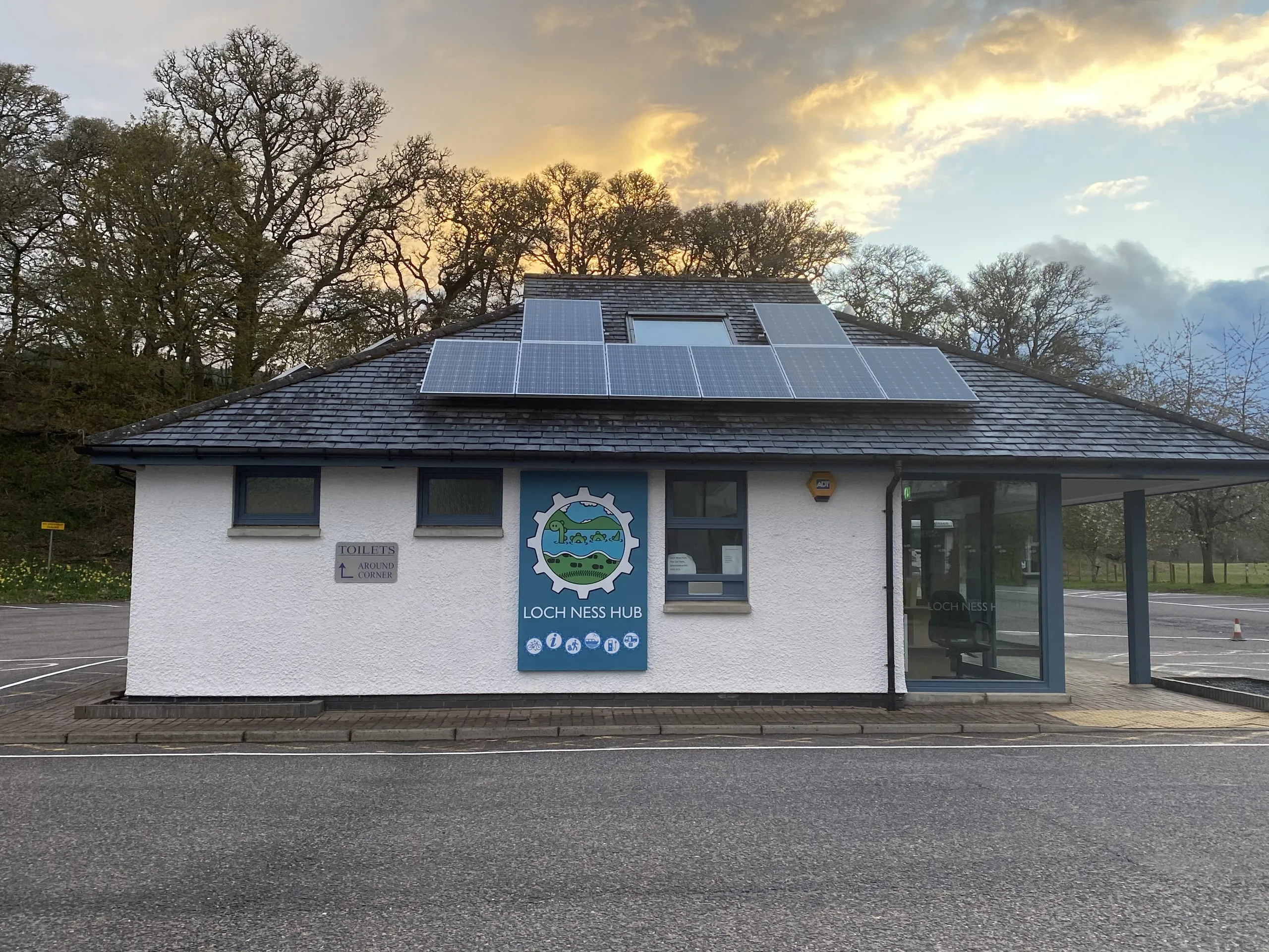 Loch Ness Hub at sunset with the solar PV array we installed on its slate roof